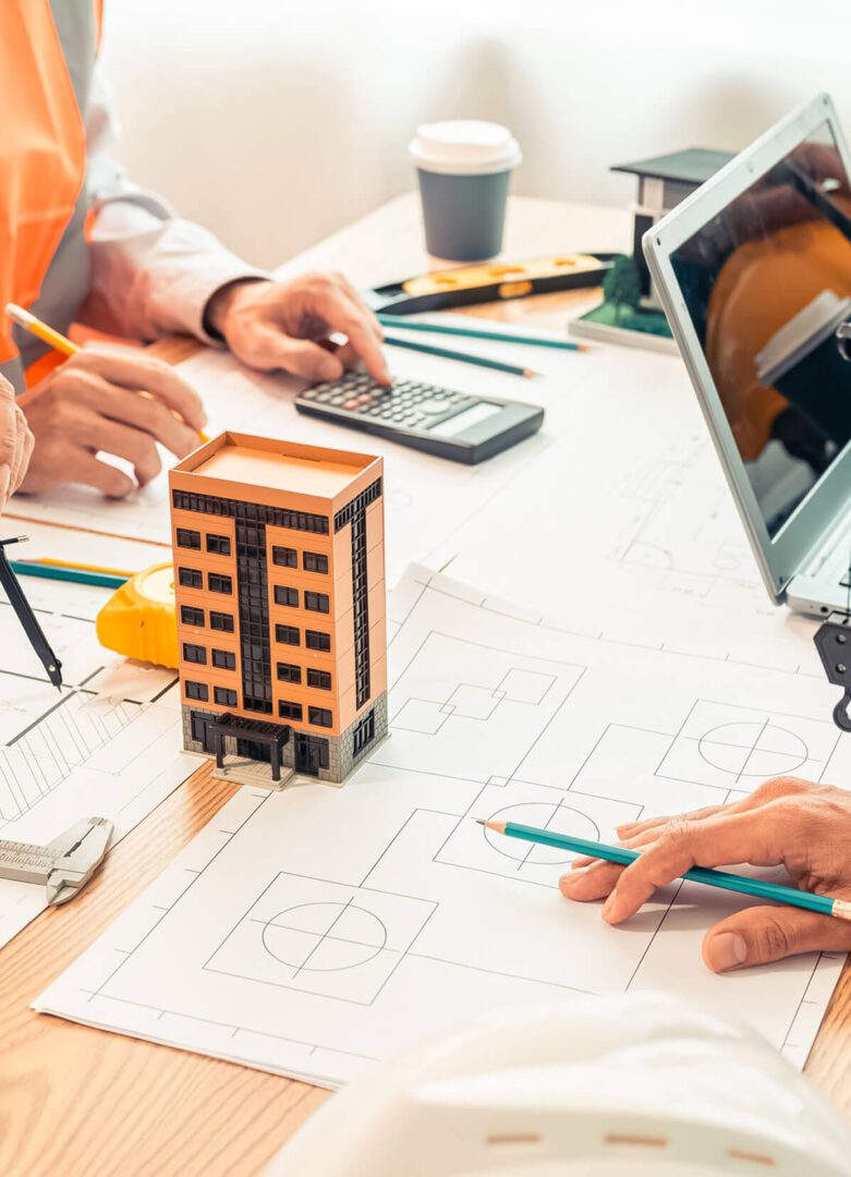 Architects working on building design plans.